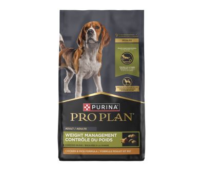 A bag of Purina Pro Plan Specialized Weight Management Shredded Blend chicken and rice formula dry dog food.